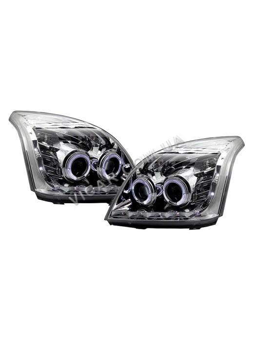 Передние фары в хромированном корпусе Toyota Prado 120